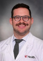 Image of Kelly Sandall  with UCH lab coat