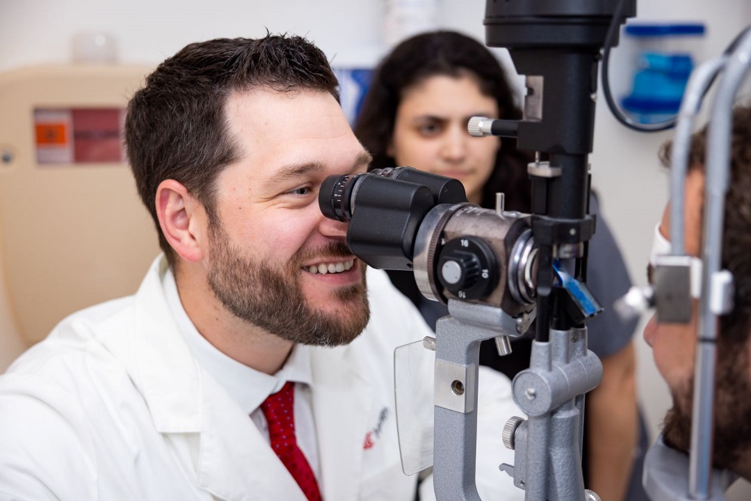 Doctors performing eye exam