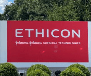 Red sign outside of a building that says Ethicon Johnson & Johnson Surgical Technologies