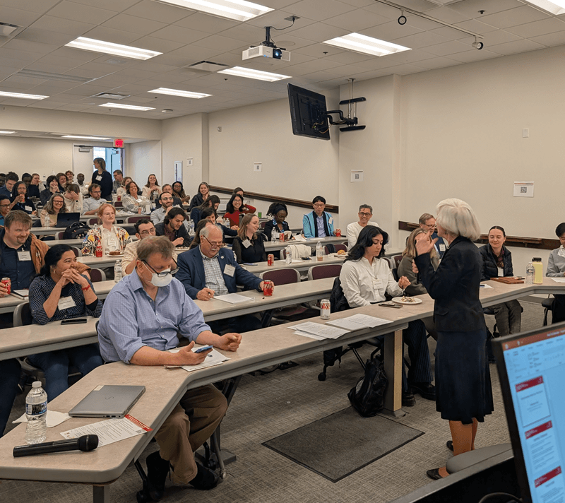 people in a classroom listening to a presenter