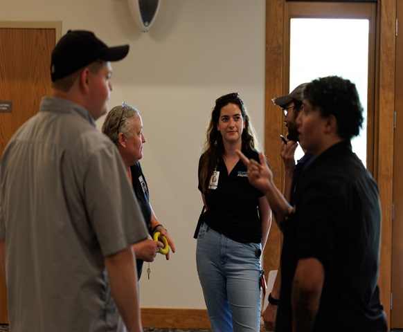 people in a small group talking