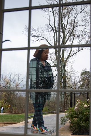 woman outside of window mindful walking