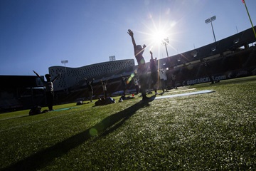 Students doing yoga on campus
