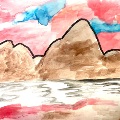 Brown mountains with red and blue sky