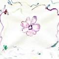 A flower with decorative ribbon and more flowers around it