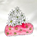a grouping of flowers within a red polka dot vase