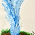 soil and grass with a water spout emerging