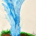 soil and grass with a water spout emerging