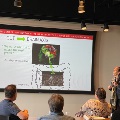 Group of people watching video presentation