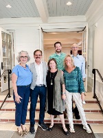 curriculum integration leaders pose at faculty retreat