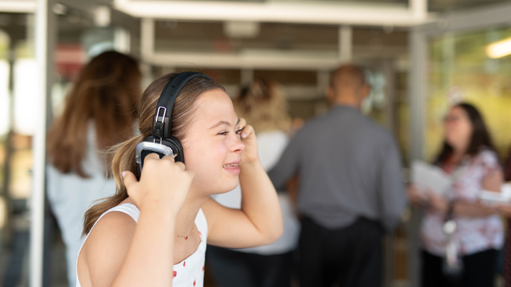 person listening to headphones