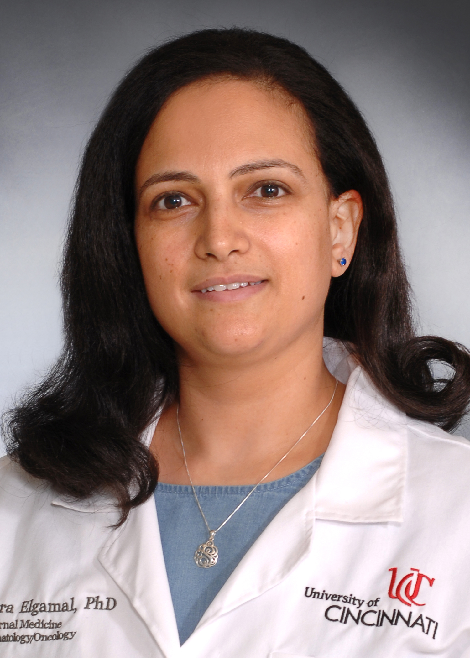 Elgamal Sara with UC lab coat