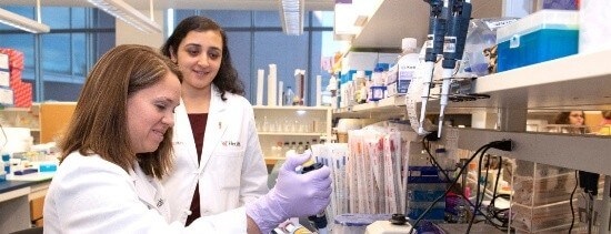 Dr. Wise-Draper and Dr. Takiar performing research