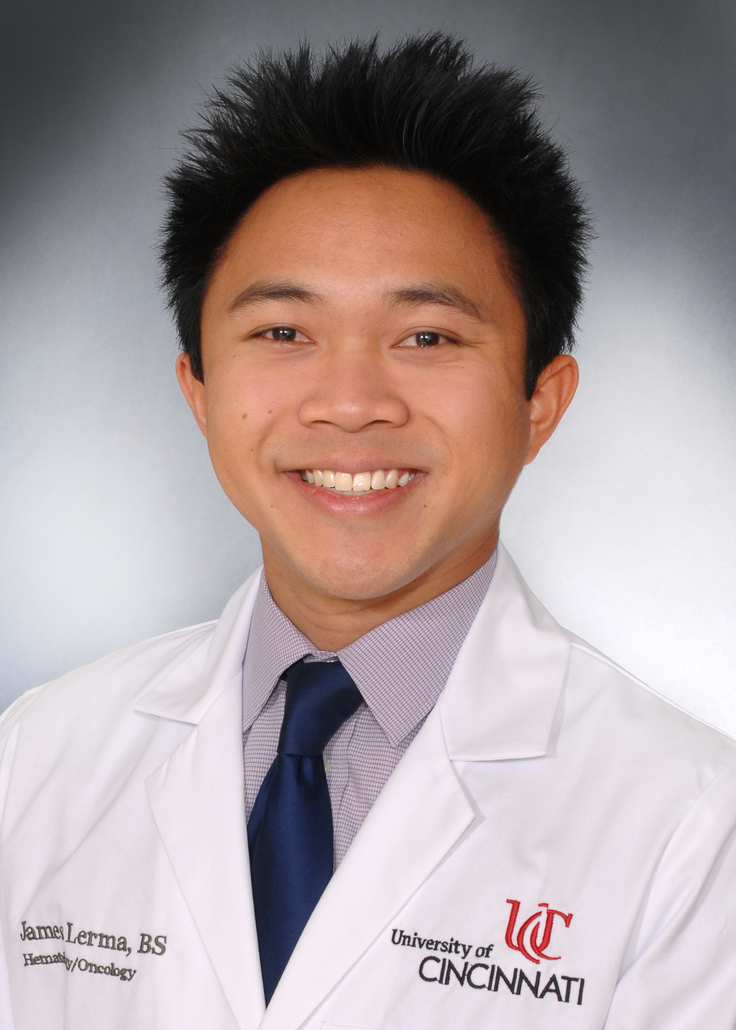 Photo of Lerma James in UC lab coat