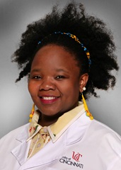 Matibiri Paidamoyo with UC lab coat