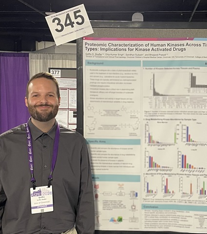 photo of Griffin Shaffer with poster
