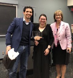 image of Dr. Kellis with award