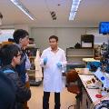man-demonstrating-lab-equipement