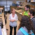 woman-demonstrating-lab-equipement